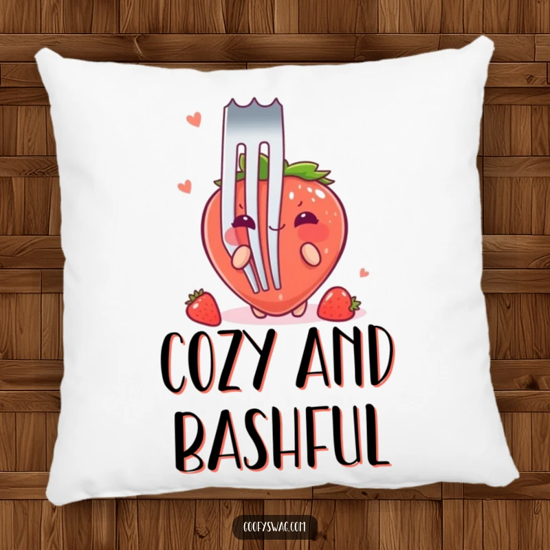 Funny Strawberry Fork Pillow: A soft pillow featuring a blushing strawberry hiding behind a large fork, bringing charm and humor.