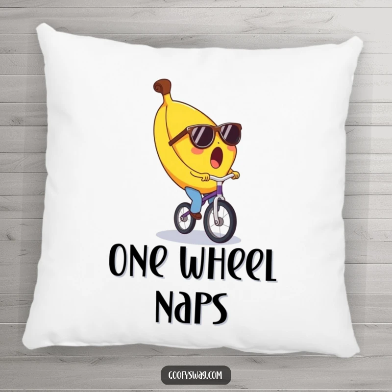 Funny banana pillow, surprised expression, wearing tiny sunglasses, riding a unicycle. Soft, huggable, and humorously decorated for ultimate comfort.