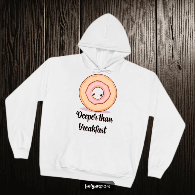 Comfortable funny hoodie featuring a doughnut with a hole peeking out from a larger doughnut, embodying cozy curiosity.