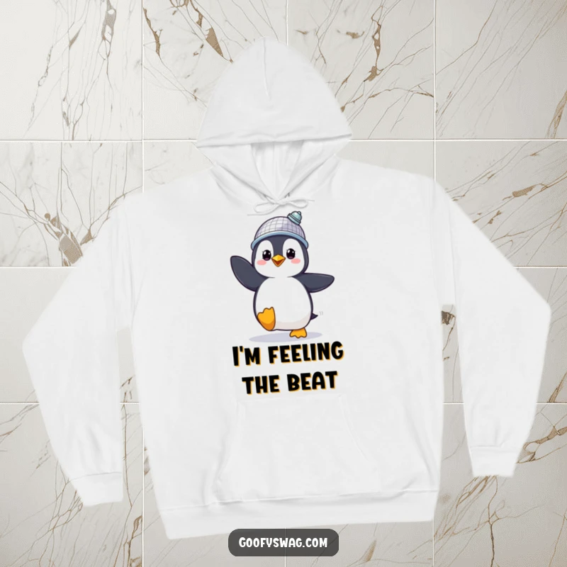 Funny Hoodie featuring a proud penguin in a disco ball hat, dancing with infectious energy, a party theme.