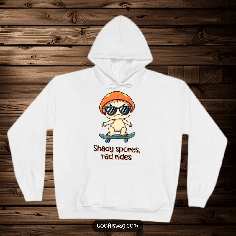 Funny hoodie featuring a grumpy mushroom wearing sunglasses, cruising on a skateboard, embodying a cool and carefree attitude.