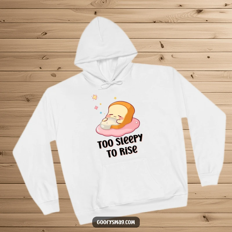 Funny hoodie featuring a sleepy bread loaf, eyes closed in happy slumber, dreaming of floating in a jelly sea, a warm and humorous garment.