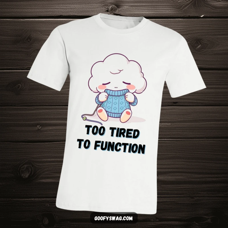 Funny sleepy cloud t-shirt, looking tired while knitting a miniature sweater, ideal for relaxed and humorous style.