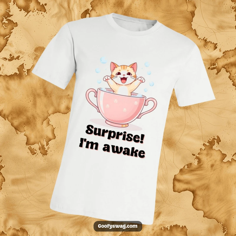 Funny cat dramatically leaping out of a giant bubbly teacup, showcasing surprise and humor on a comfortable graphic tee.