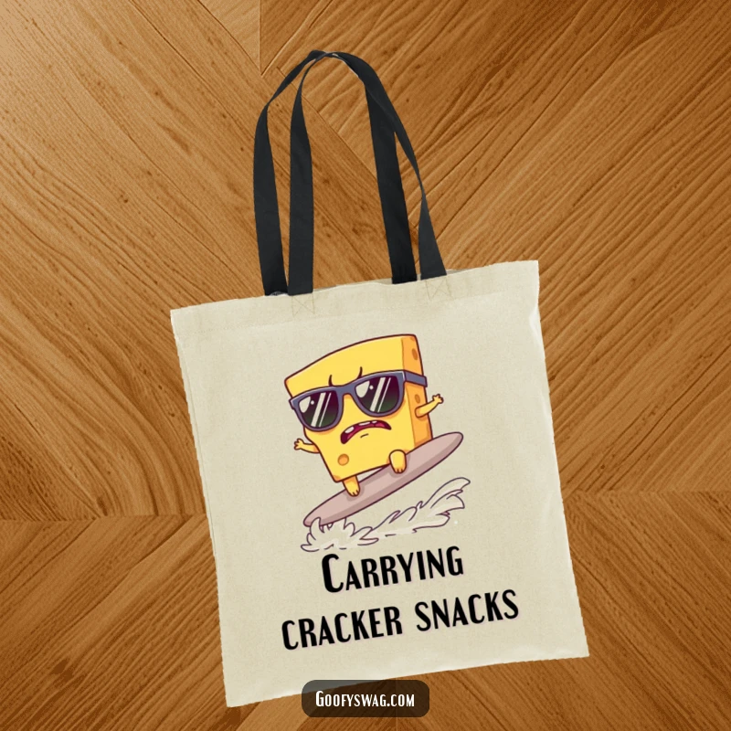 Funny tote bag showing a grumpy cheese slice with sunglasses surfing a cracker, great for groceries or beach trips.