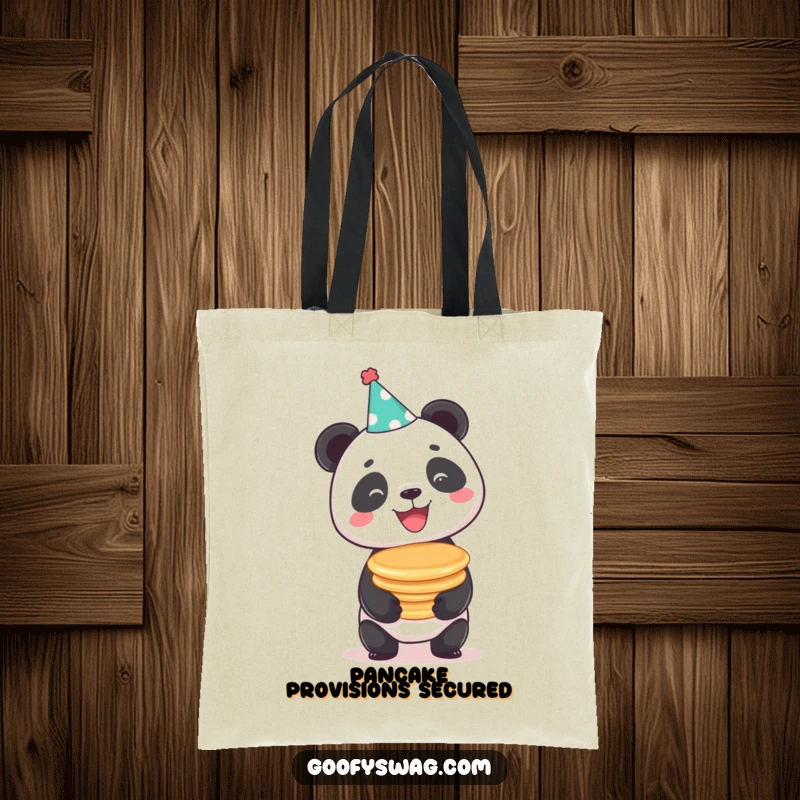 Funny beaming panda balancing a stack of pancakes, a durable and humorous tote bag for everyday use.